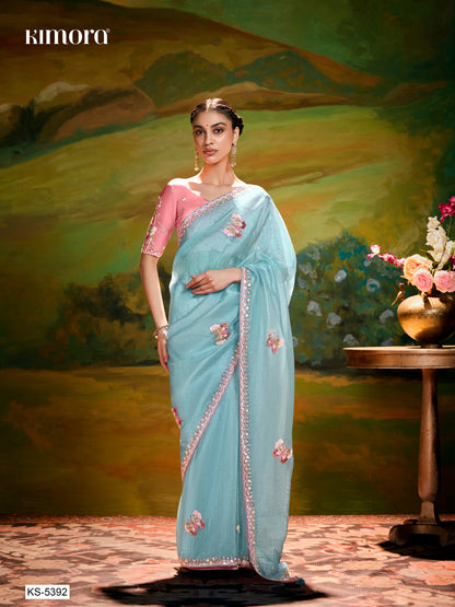 Dhiyona KM Women Aqua Blue Saree With Red Blouse