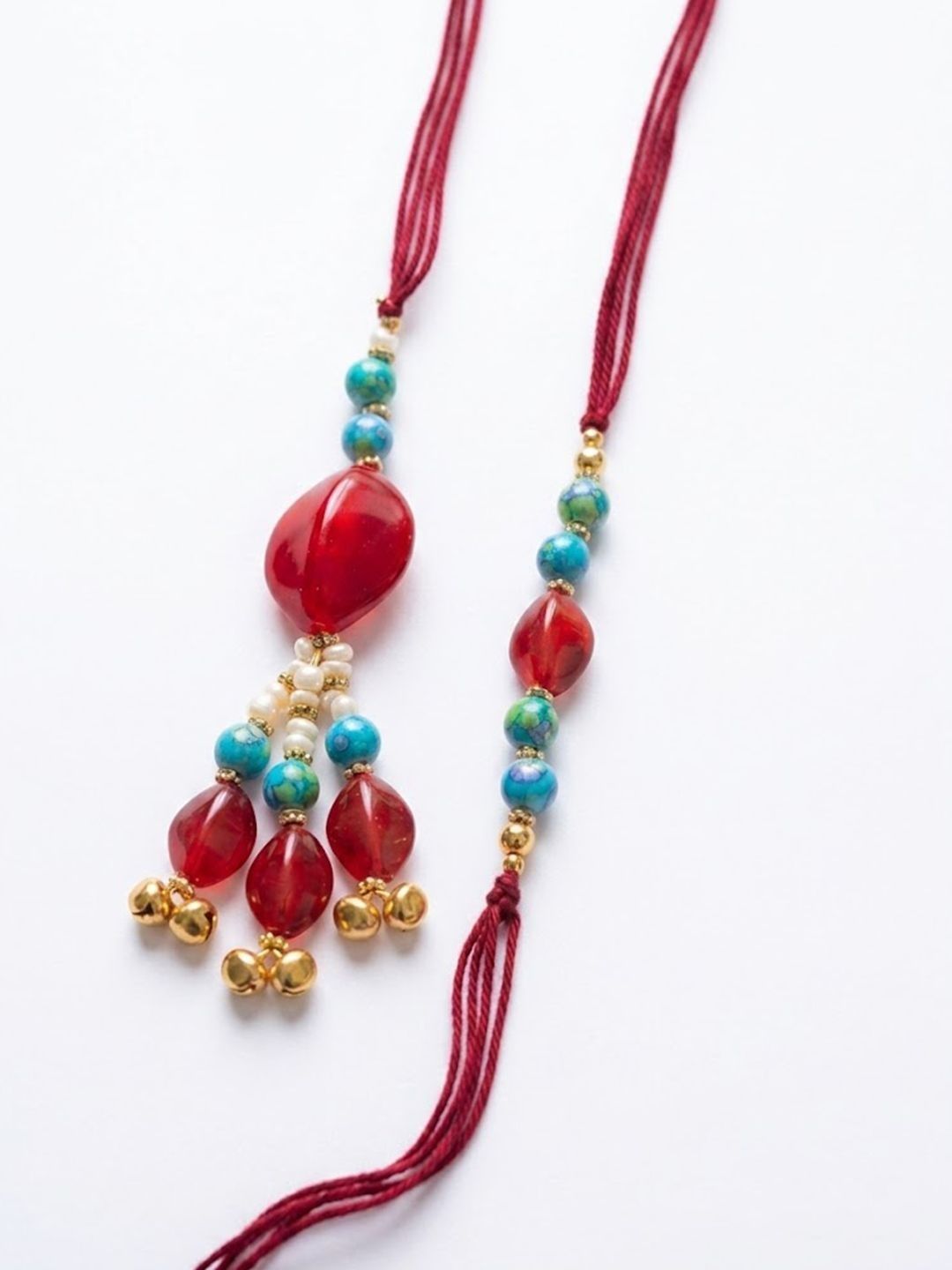 Dhiyona Set Of 2 Artificial Beads & Gold Toned Ghungroo Bhaiya Bhabhi Rakhi With Roli Chawal
