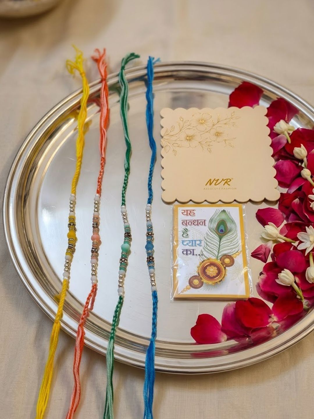 Dhiyona Set Of 4 Multicolor Artificial Beads Thread Rakhi With Roli Chawal Chandan Mishri