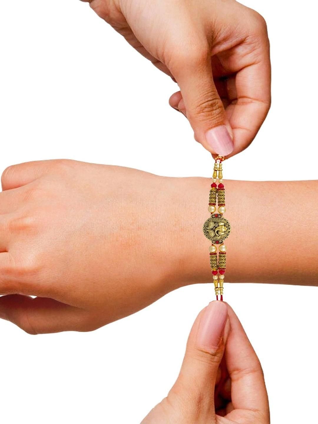 Dhiyona Lord Ganesha Motif Thread Rakhi