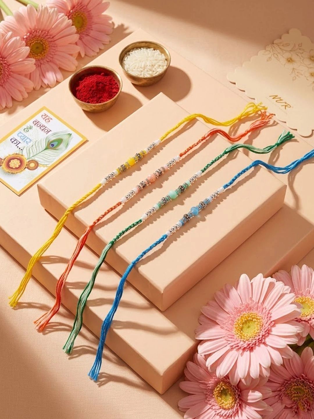 Dhiyona Set Of 4 Multicolor Artificial Beads Thread Rakhi With Roli Chawal Chandan Mishri
