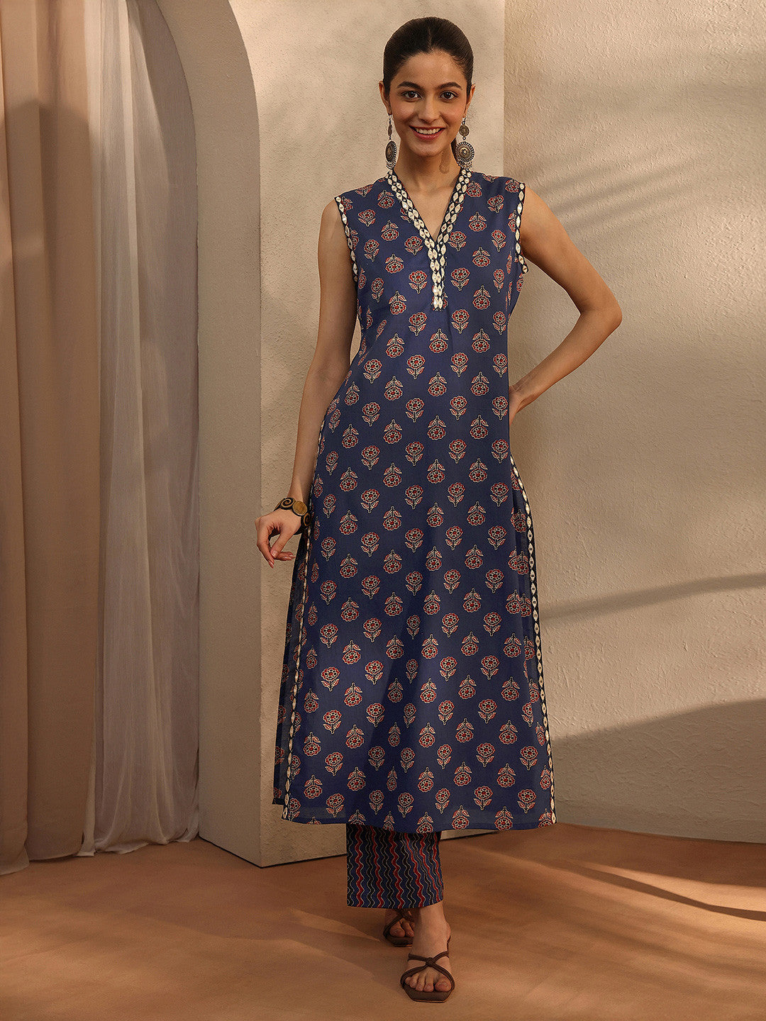 Women Ethnic Motifs Printed Regular Thread Work Kurta with Trousers
