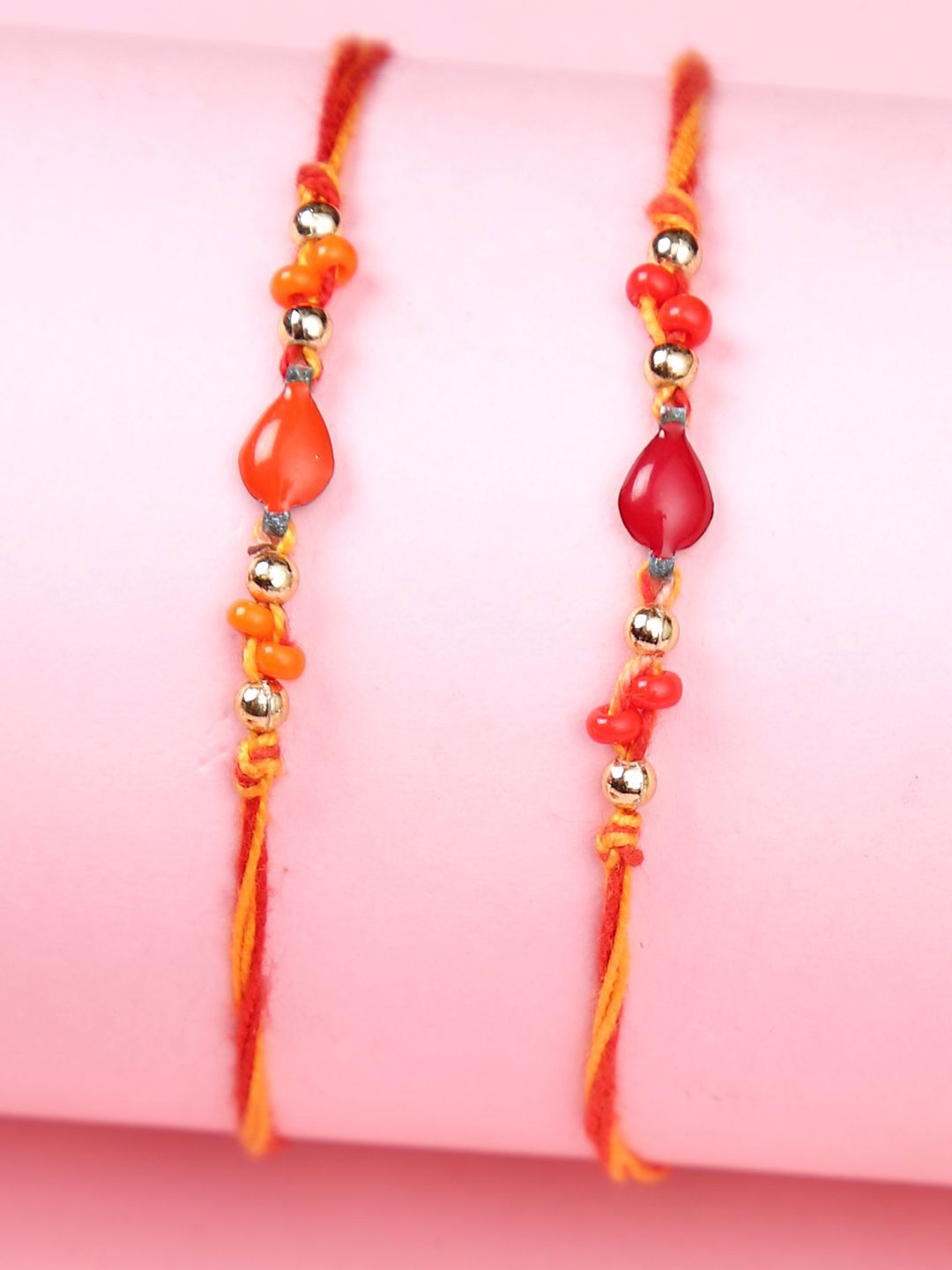Dhiyona Orange Set Of 2 Beaded Thread Rakhis With Roli Chawal & Greeting Card