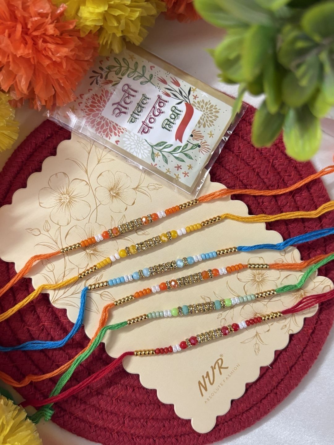 Dhiyona Set Of 6 Multi Artificial Beads Thread Rakhi With Roli Chawal Chandan Mishri