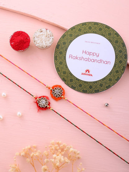 Dhiyona Set Of 2 Red Flower Design Stone Studded Rakhis Comes With Roli Rice & Greeting Card