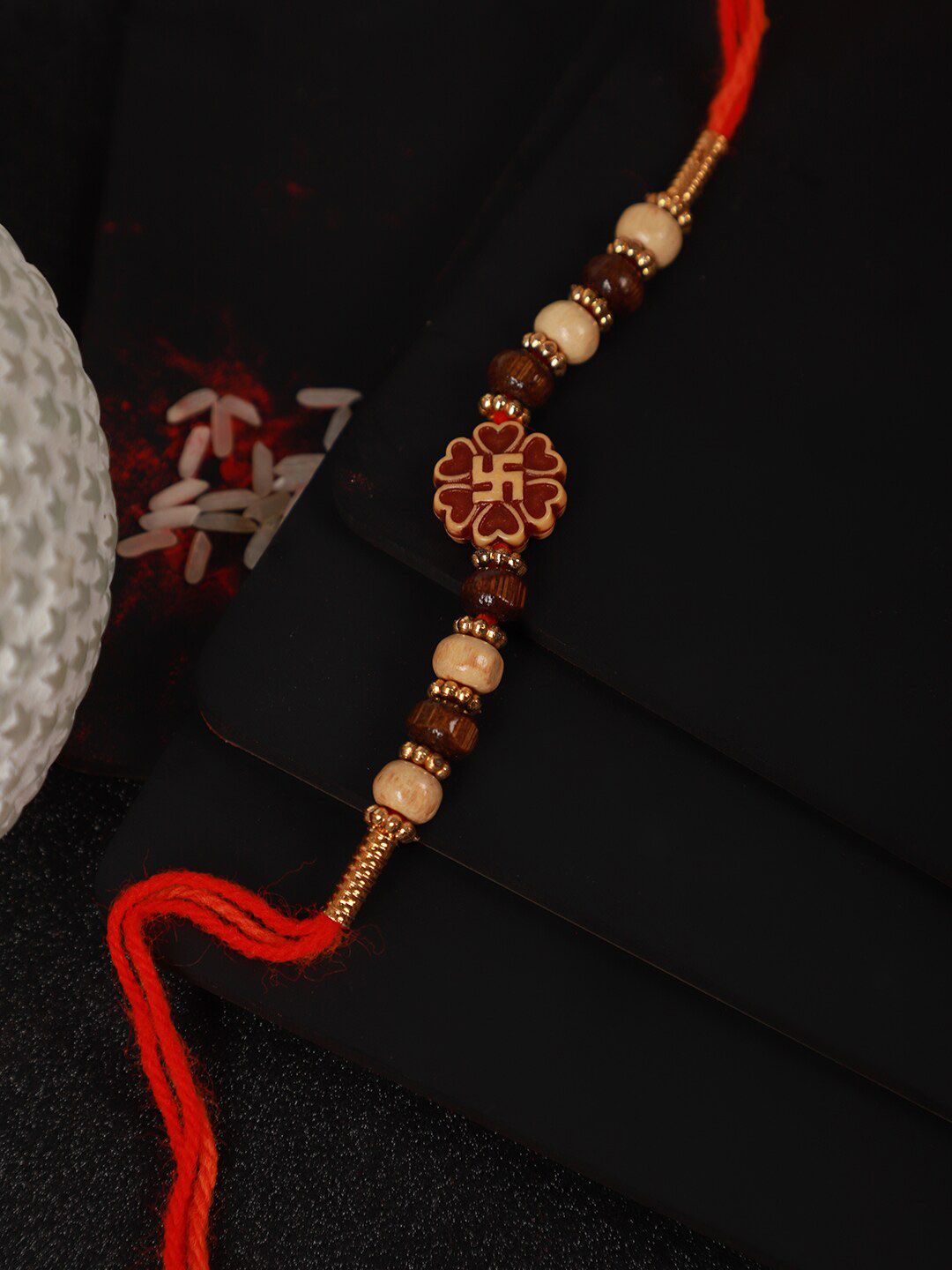 Dhiyona Unisex Red Swastik Charm & Beaded Rakhi With Roli Chawal & Greetings Card
