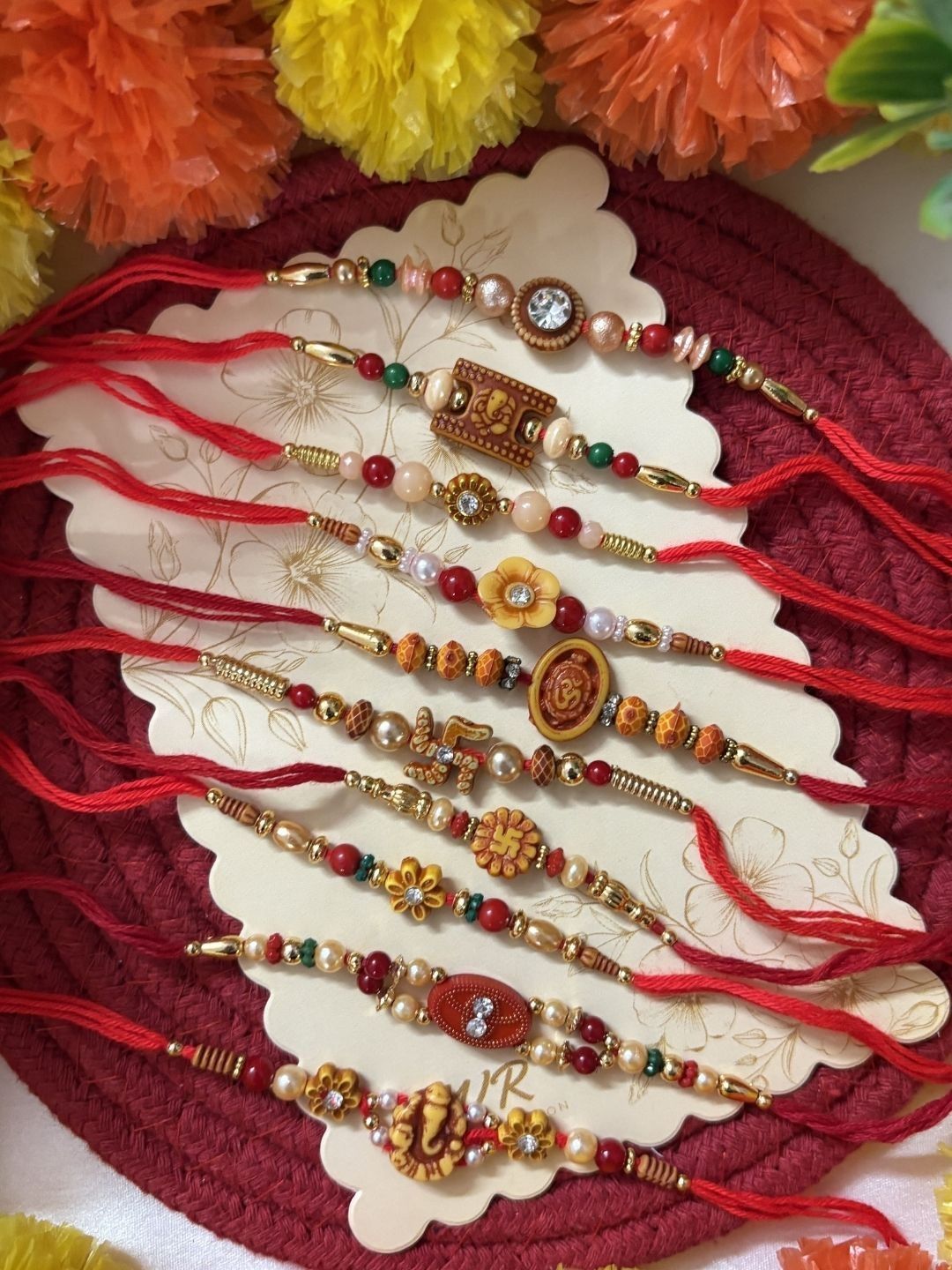Dhiyona Set Of 10 Multicolor Designer Thread Rakhi With Roli Chawal Chandan Mishri