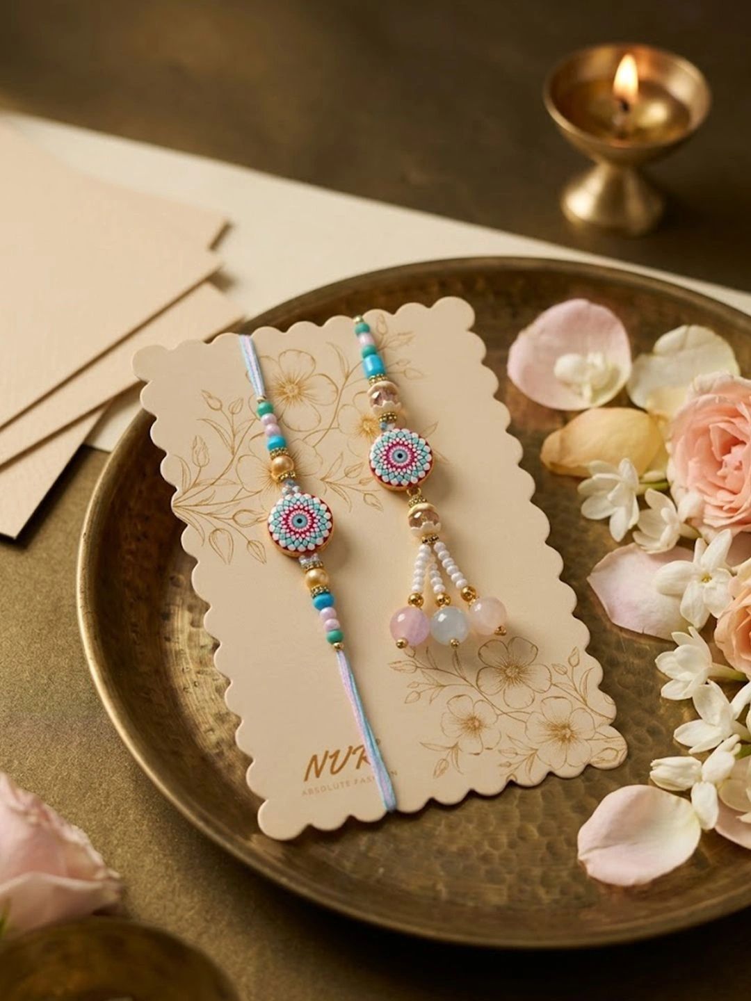 Dhiyona Set Of 2 Floral Design Bhaiya Bhabhi Rakhi With Roli Chawal Chandan Mishri