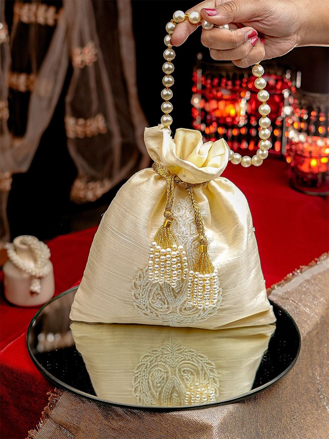 Dhiyona NR Ethnic Motifs Embroidered Potli Clutch