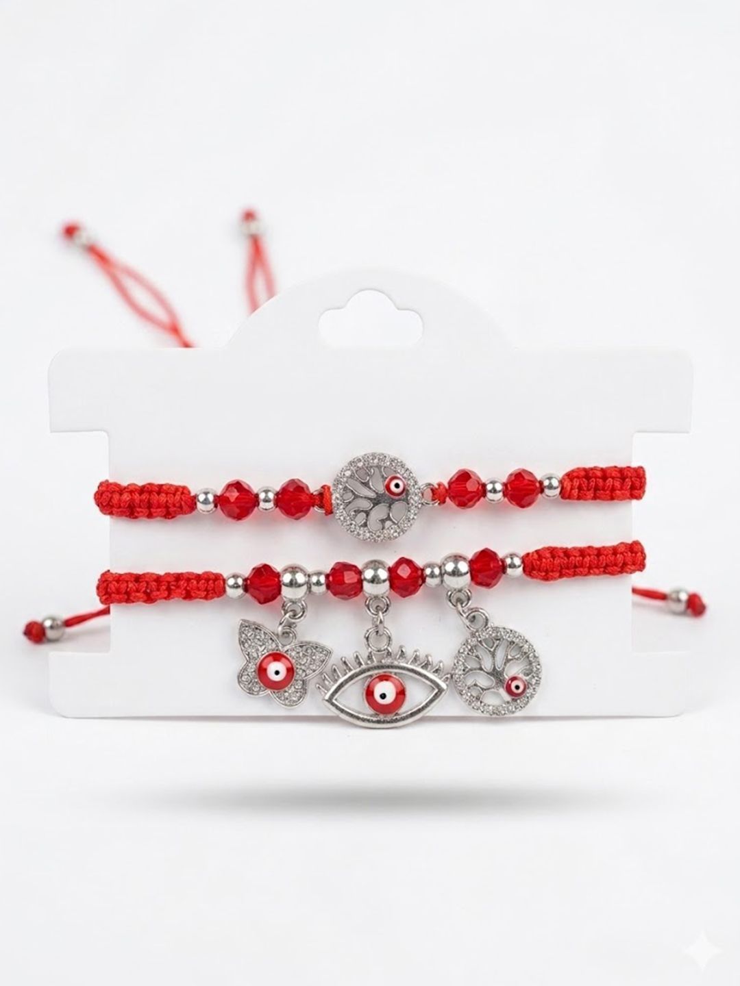 Dhiyona Set Of 2 Red & Silver Evil Eye Design Bhaiya Bhabhi Rakhi With Roli Chawal Chandan