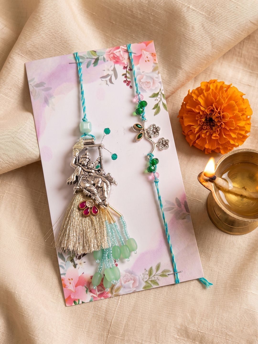 Dhiyona Set Of 2 Designer Religious Silver Toned Bhaiya Bhabhi Rakhi