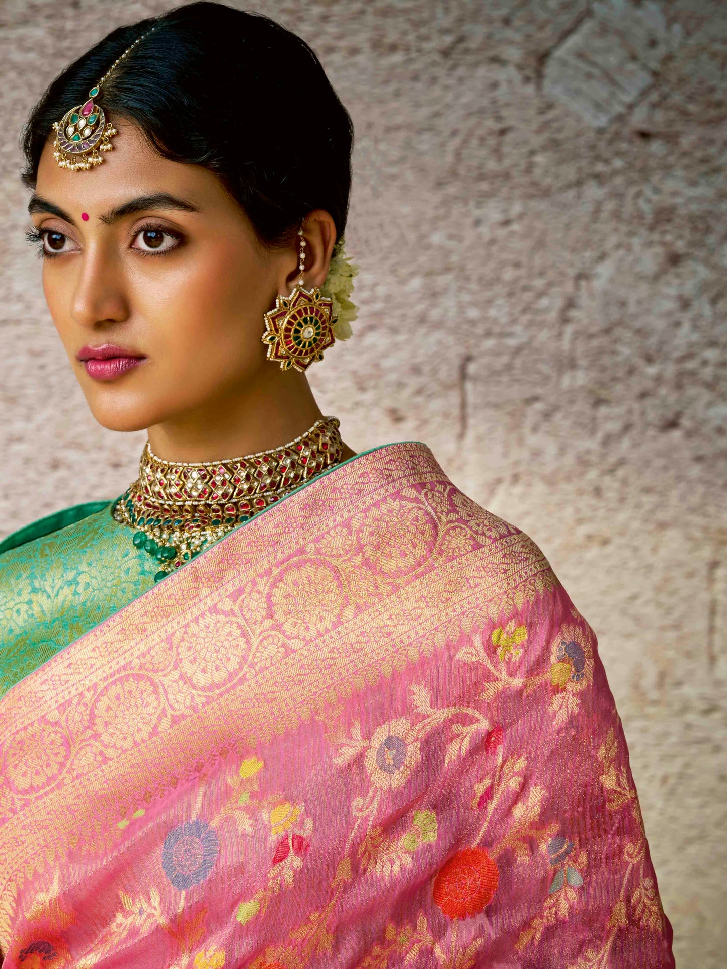 Dhiyona KM Women Pastel Pink Banarasi Silk Saree With Zari Weaving & Contrast Green Embroidered Blouse