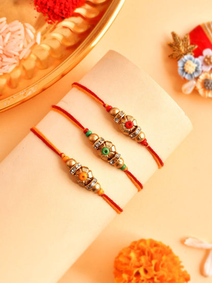 Dhiyona Set Of 3 Gold-Toned Beaded Rakhi With Roli Rice & Greeting Card