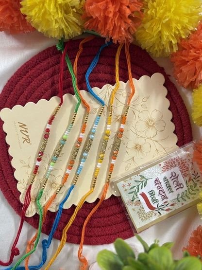 Dhiyona Set Of 6 Multi Artificial Beads Thread Rakhi With Roli Chawal Chandan Mishri