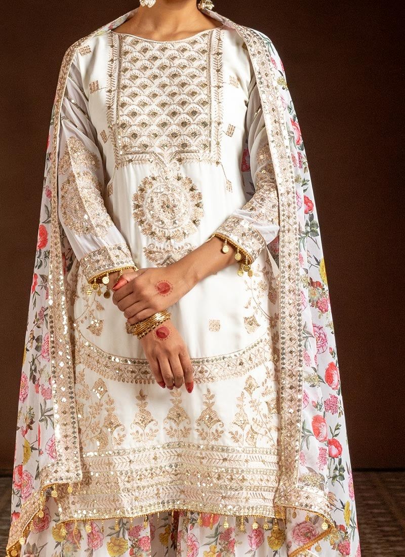Dhiyona KL Women Floral Embroidered Regular Sequinned Kurta with Sharara & With Dupatta