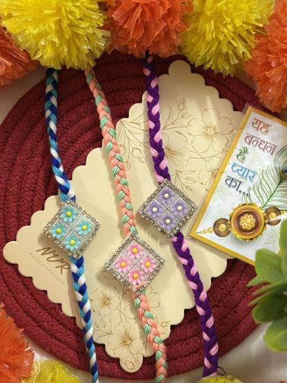 Dhiyona Set Of 3 Multicolor Ad Thread Rakhi With Roli Chawal Chandan Mishri