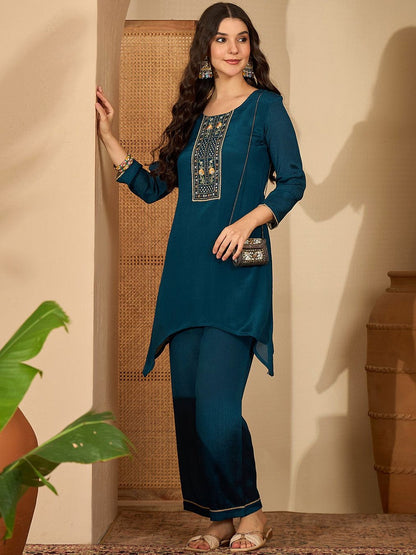 Women Ethnic Motifs Embroidered Asymmetric Sequinned Kurti with Palazzos