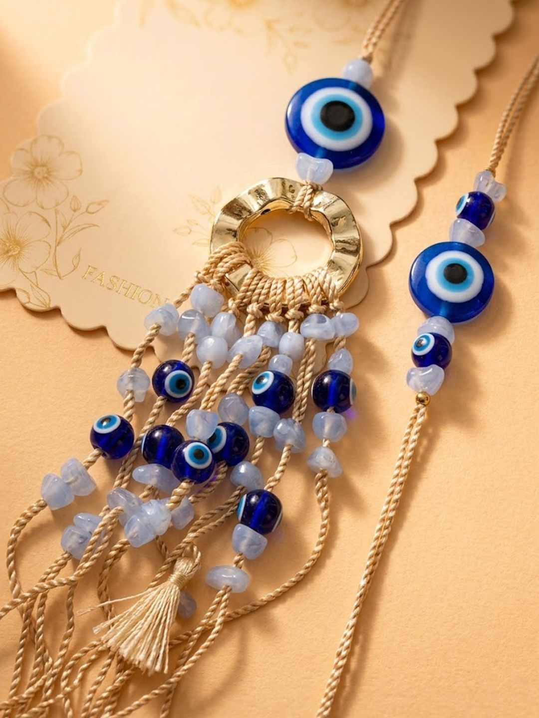 Dhiyona Set Of 2 Gold Toned Round Evil Eye Bhaiya Bhabhi Rakhi