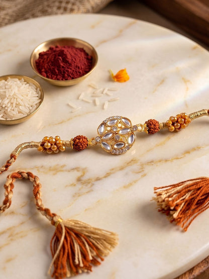 Dhiyona Rudraksh & Kundan Studded Gold Toned Thread Rakhi With Roli Chawal Chandan Mishri