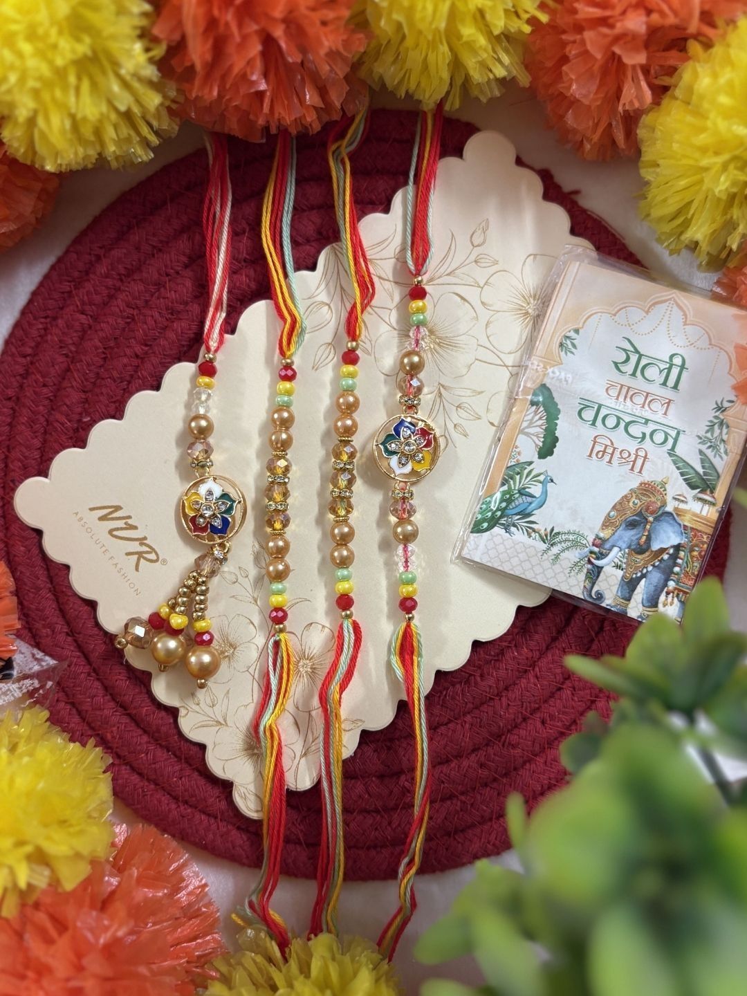 Dhiyona Set Of 4 Artificial Beads Family Pack Thread Rakhi With Roli Chawal Chandan Mishri