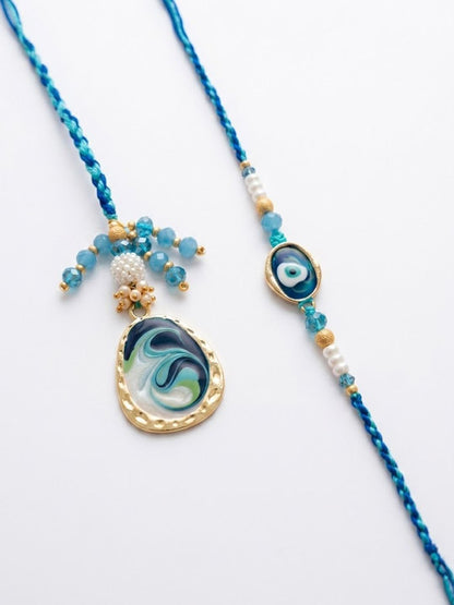 Dhiyona Set Of 2 Blue Evil Eye Traditional Gold Toned Bhaiya Bhabhi Rakhi With Roli Chawal