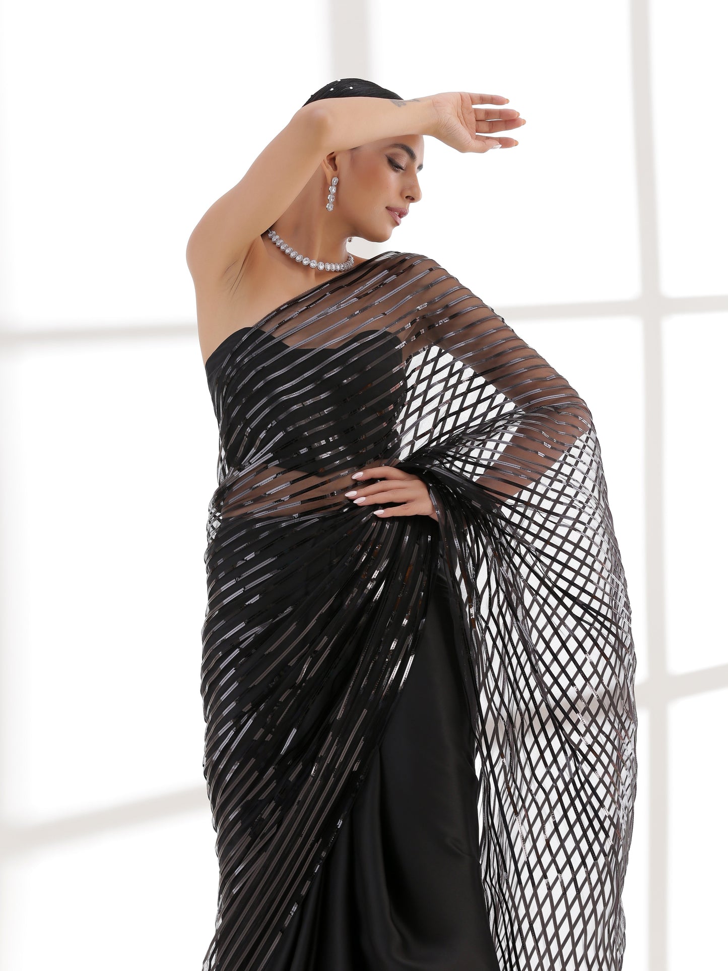 Dhiyona ST Black Impression Net saree