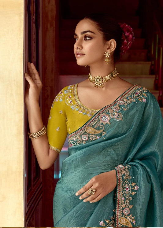 Dhiyona KM Women Teal Designer Tissue Silk Saree