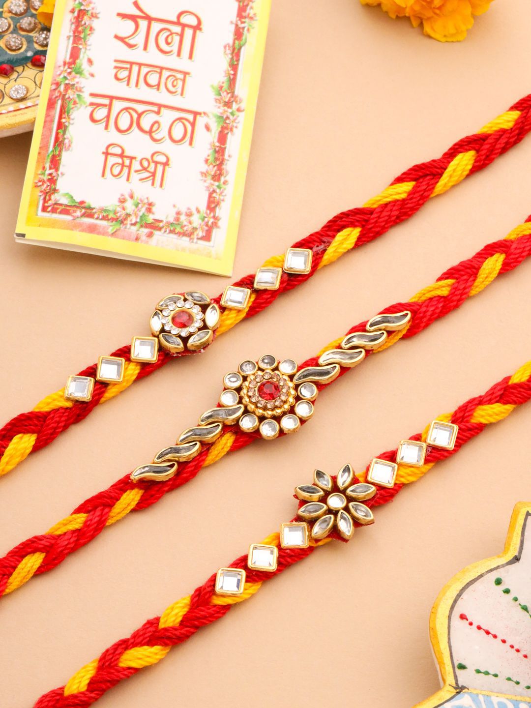 Dhiyona Men Set Of 3 Red & Yellow Kundan Studded Floral Design Thread Rakhi With Roli Chawal