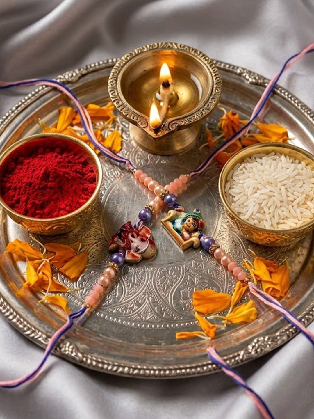 Dhiyona Set Of 2 Krishna Ji & Ganesh Ji Beaded Religious Thread Rakhi With Roli Chawal