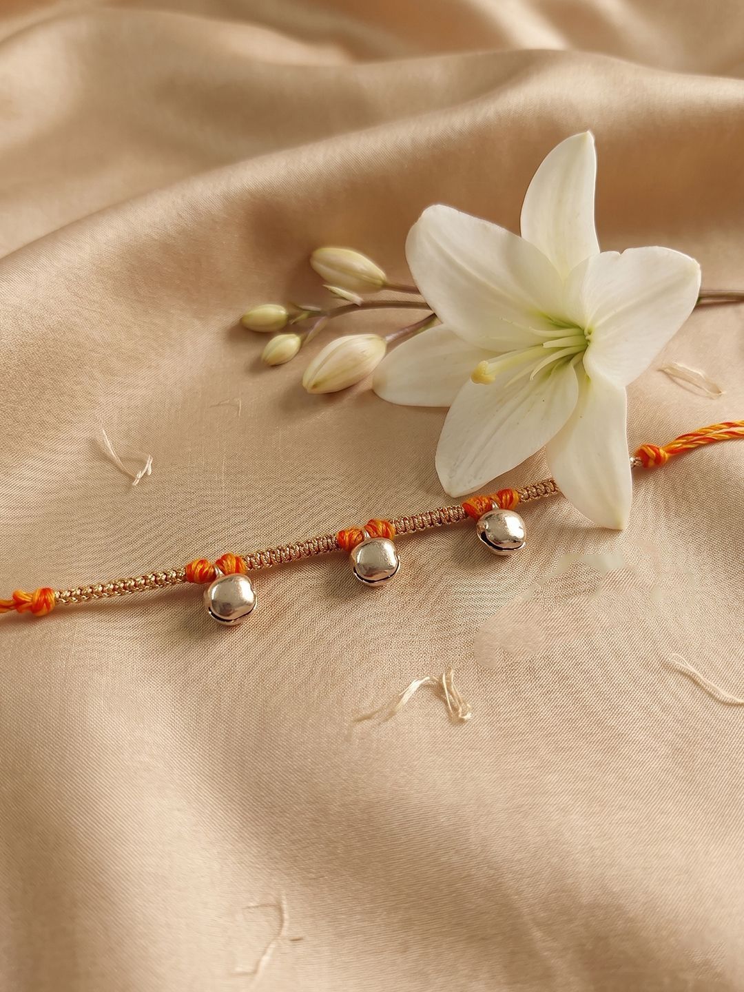 Dhiyona Golden Ghungroo Thread Rakhi With Roli Chawal Chandan Mishri