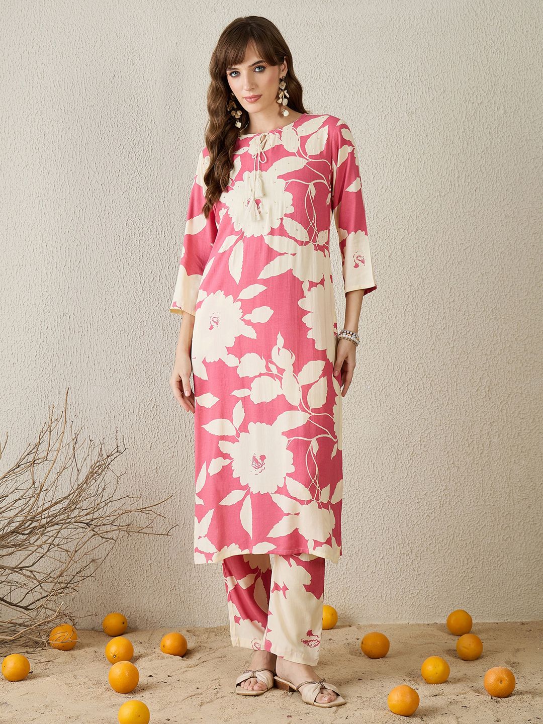 Dhiyona IE Women Peach Floral Printed Regular Kurta with Trousers