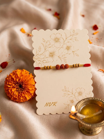 Dhiyona Religious Rudraksh & Red Thread Rakhi With Roli Chawal Chandan Mishri
