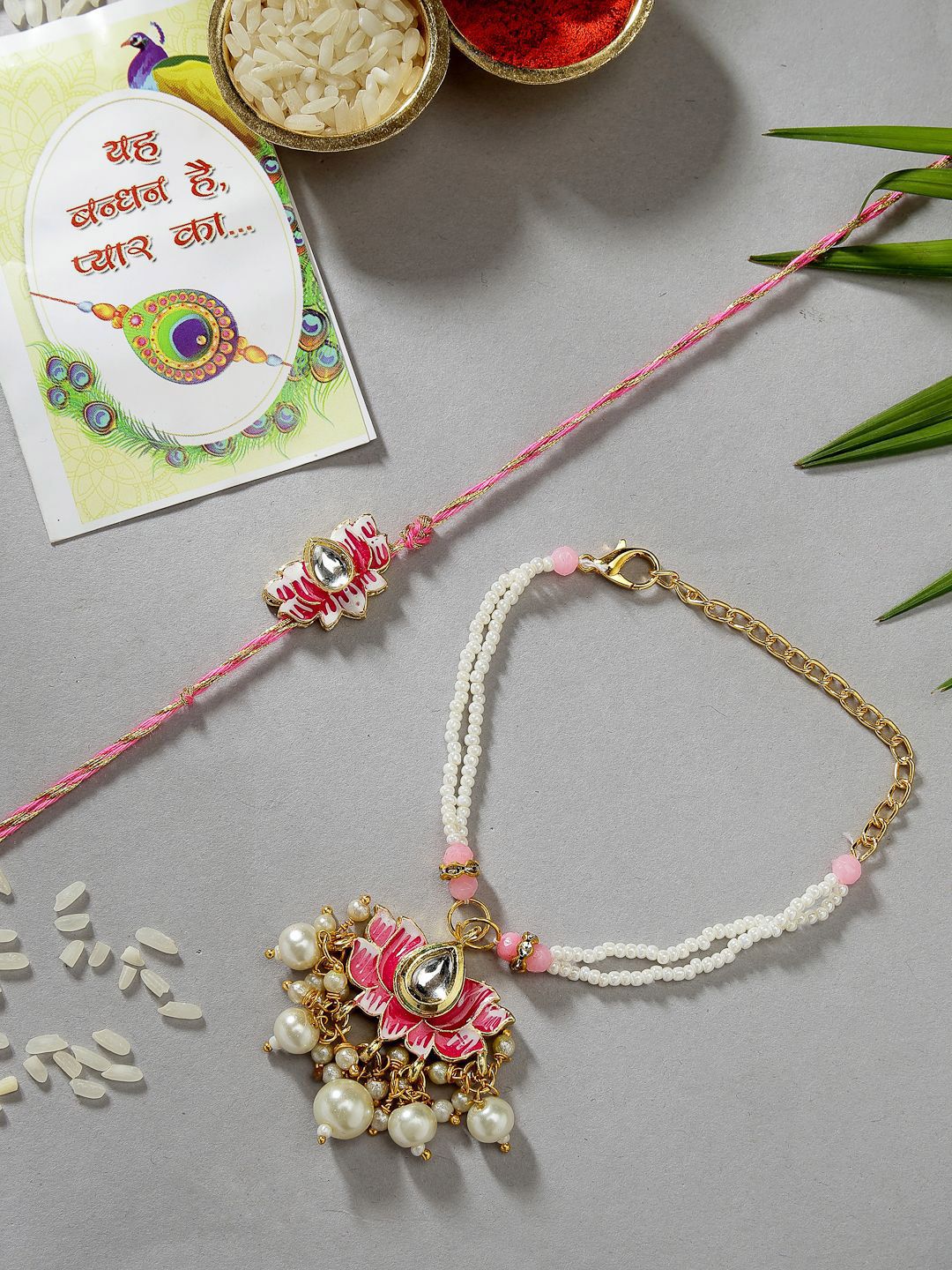 Dhiyona Unisex Set Of 2 Pink Lotus Shape Kundan-Studded & Beaded Wraparound Rakhi Set