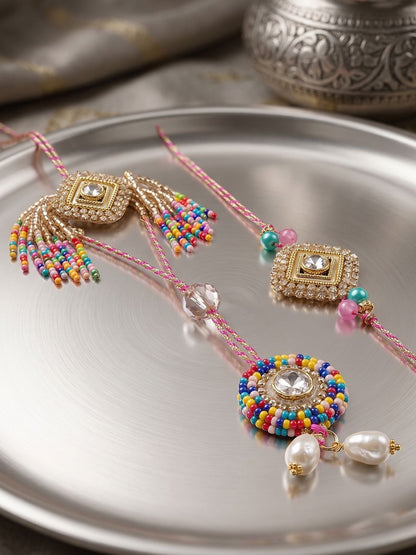 Dhiyona Set Of 2 White Artificial Stones Golden Toned Bhaiya Bhabhi Rakhi With Roli Chawal