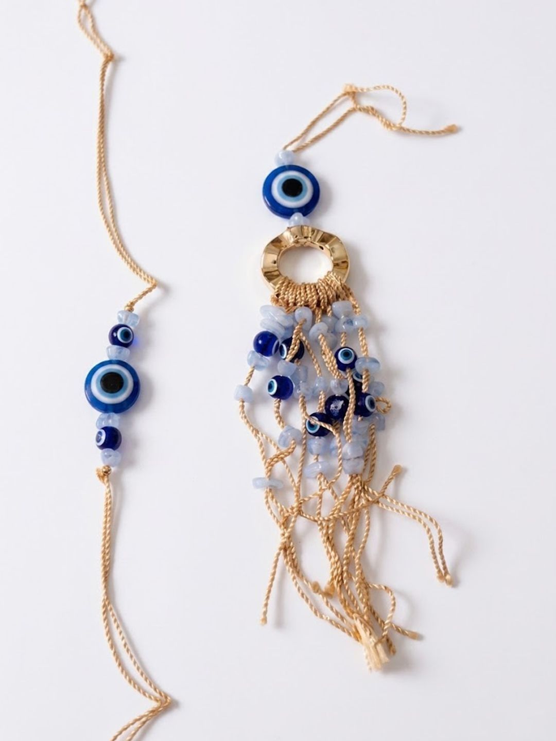 Dhiyona Set Of 2 Gold Toned Round Evil Eye Bhaiya Bhabhi Rakhi