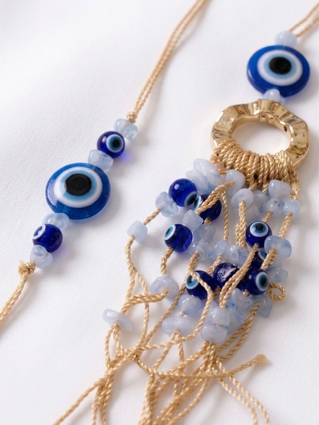 Dhiyona Set Of 2 Gold Toned Round Evil Eye Bhaiya Bhabhi Rakhi