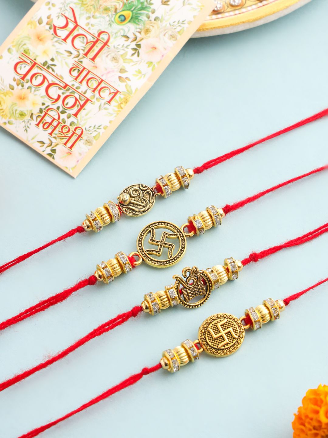 Dhiyona Set Of 2 Stones Studded Swastik Design Thread Rakhis & Roli Chawal Chandan