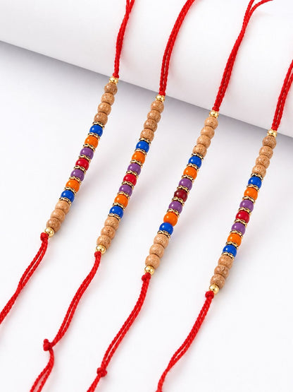 Dhiyona Set Of 4 Multicolor Circular Beads Studded Thread Rakhi With Roli Chawal Chandan
