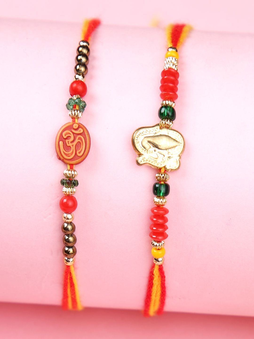 Dhiyona Set Of 2 Red Om & Lord Ganesh Beaded Rakhi With Roli Rice & Greeting Card