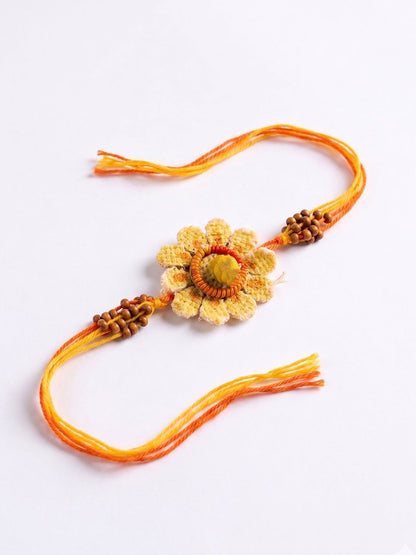 Dhiyona Yellow Floral Seed Thread Rakhi With Roli Chawal Chandan Mishri