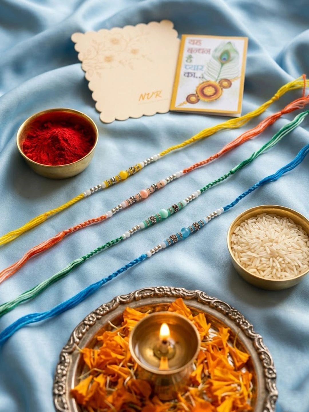 Dhiyona Set Of 4 Multicolor Artificial Beads Thread Rakhi With Roli Chawal Chandan Mishri
