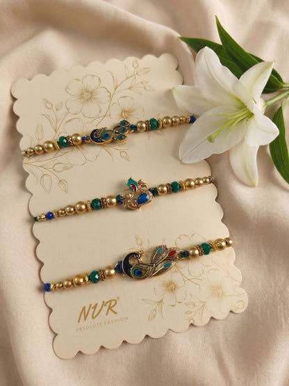 Dhiyona Set Of 3 Peacock Design Multicolor Artificial Beads Thread Rakhi With Roli Chawal