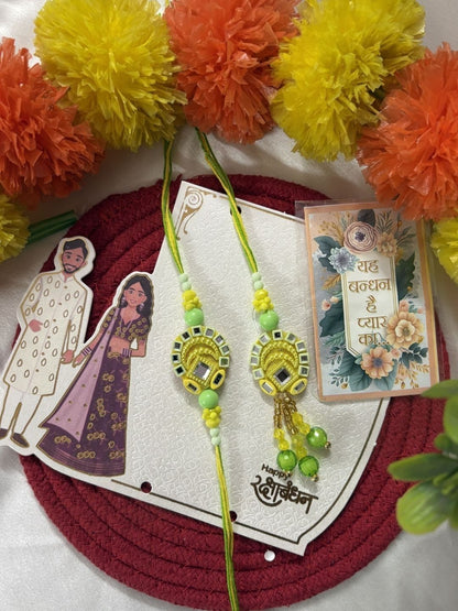 Dhiyona Set Of 2 Artificial Beads Mirror Work Bhaiya Bhabhi Rakhi With Roli Chawal Chandan